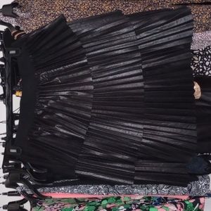 Black pleaded skirt